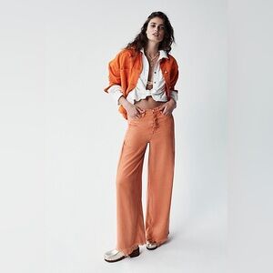 We The Free Burnt Orange Flare Jeans